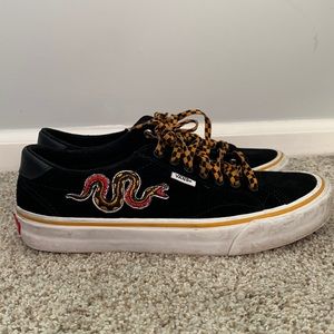 Vans embroidered black suede snake and cheetah low tops, lightly worn